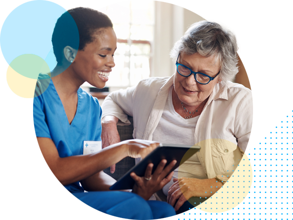 Happy nurse with elderly patient - HealthStream